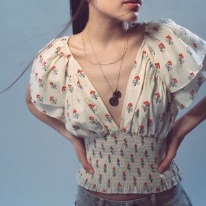 Kiana Smocked Kit Flutter Sleeve V Neck Top